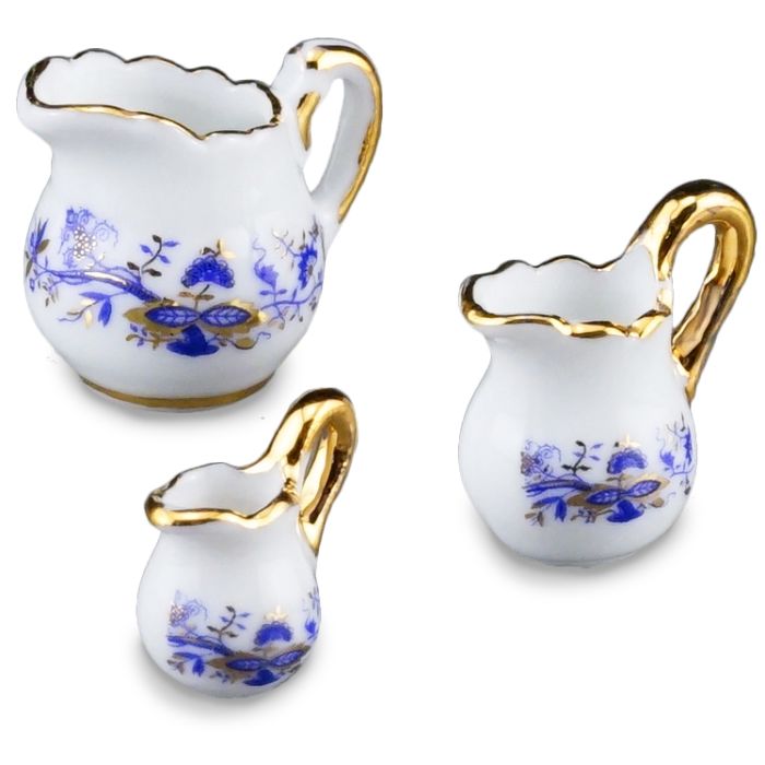 Three Blue and Gold Porcelain Jugs
