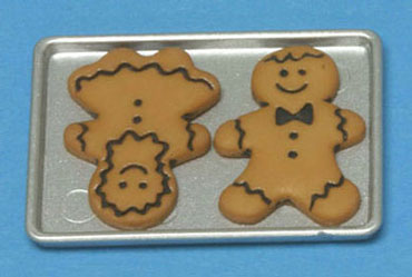 Gingerbread Boy and Girl On Cookie Sheet