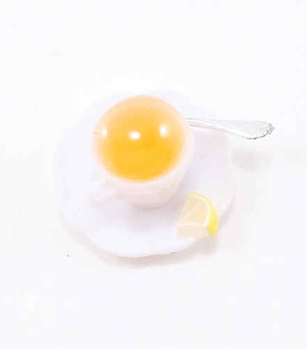 Cup Of Hot Tea with Lemon On Saucer with Spoon