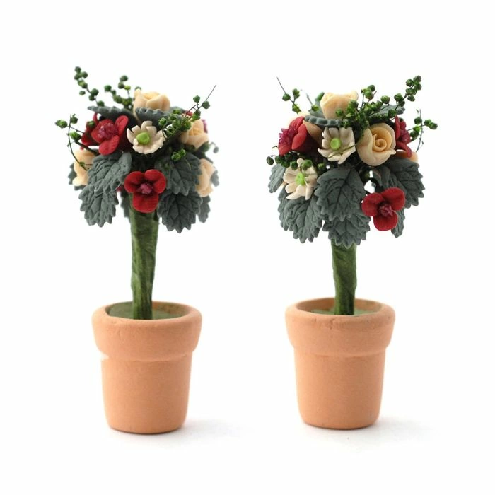 Two Standard Roses In Pots.